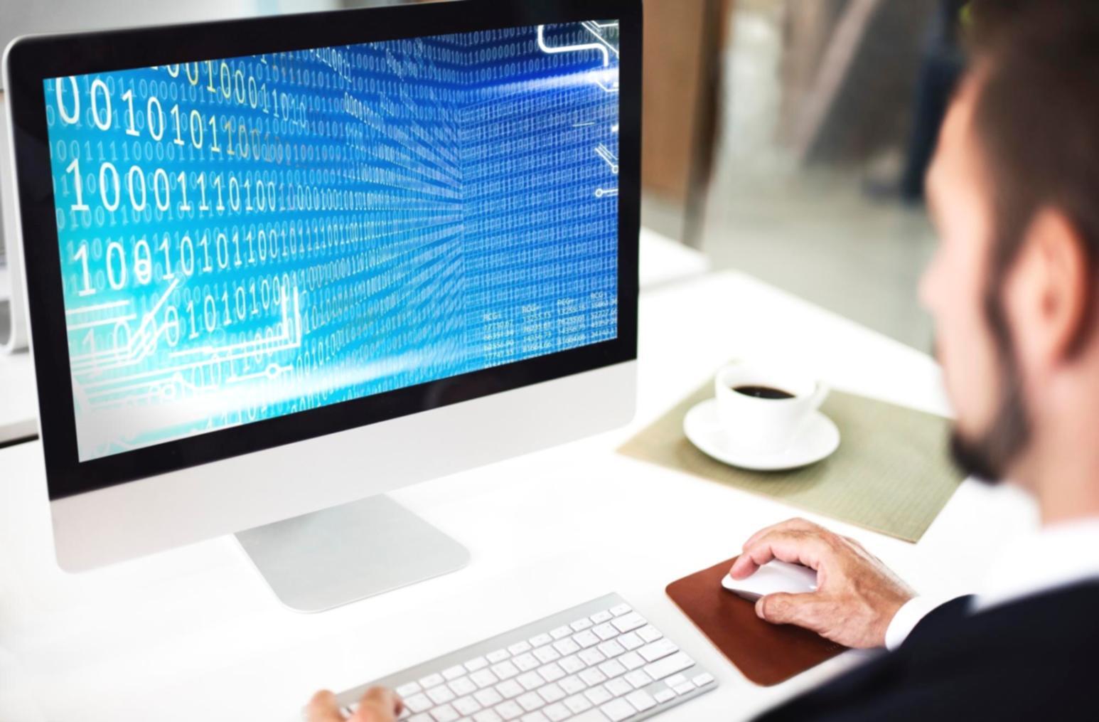 Close-up of developer hands working on cryptocurrency wallet integration and transaction handling code