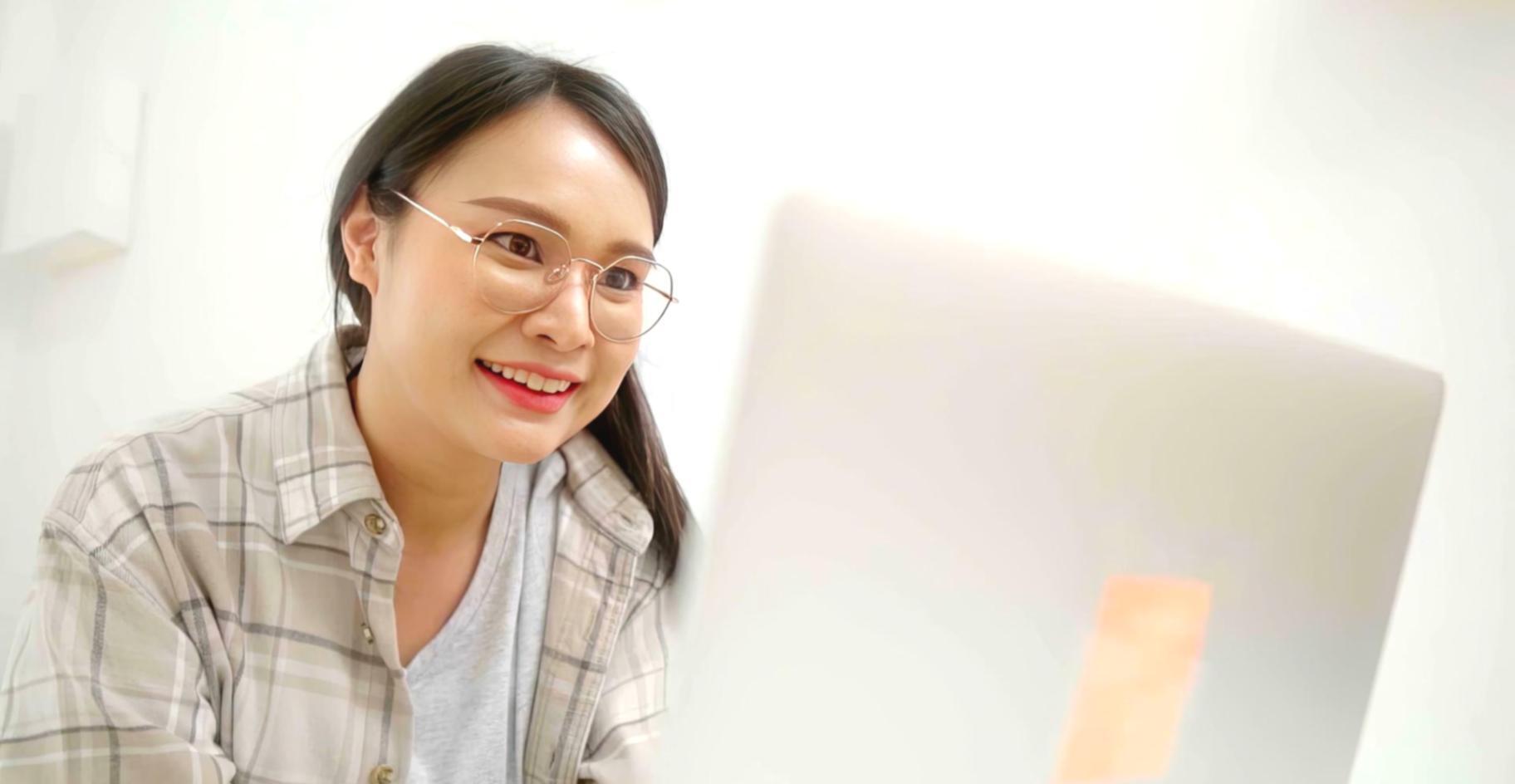 Blockchain development workspace with multiple monitors showing smart contract code